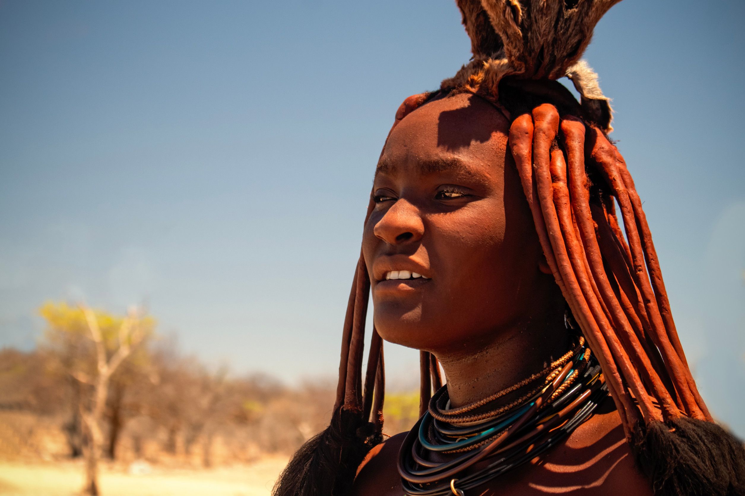 A Himba Woman In Her Village In Namibia