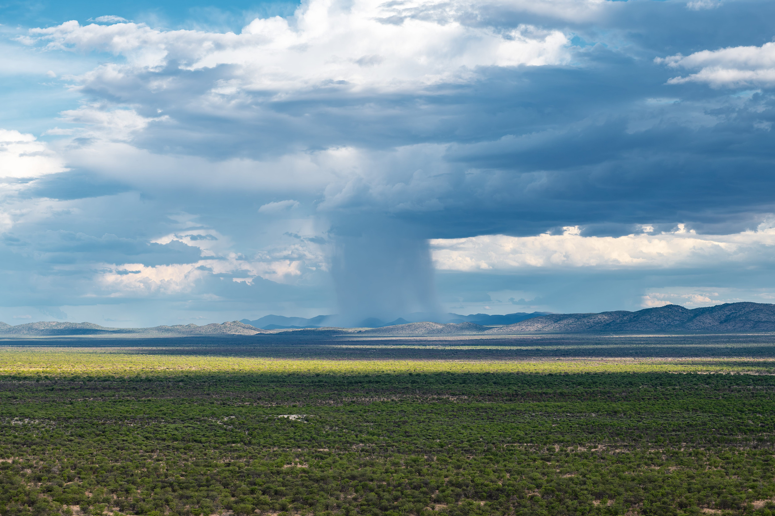 Rain and storm clouds over the Ugab River valley in Namibia